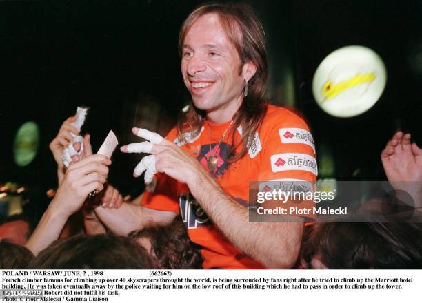 Poland / Warsaw/ June 1998 French Climber Famous For Climbing Up Over 40 Skyscrapers Throught The World, Is Being Surrouded By Fans Right After He...