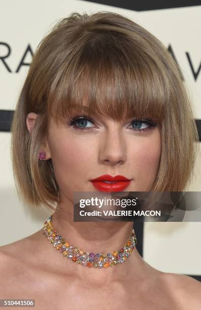 Singer Taylor Swift arrives on the red carpet during the 58th Annual Grammy Music Awards in Los Angeles February 15, 2016. AFP PHOTO/ Valerie MACON