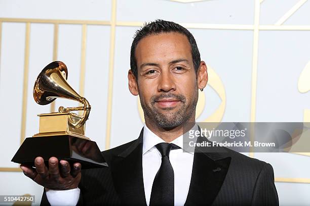 Composer Antonio Sanchez, winner of Best Score Soundtrack for Visual Media for "Birdman", poses in the press room during The 58th GRAMMY Awards at...