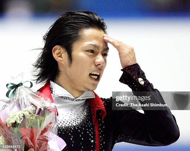 Daisuke Takahashi of Japan reacts after competing in the Men's Singles Short Program during day one of the 74th All Japan Figure Skating...