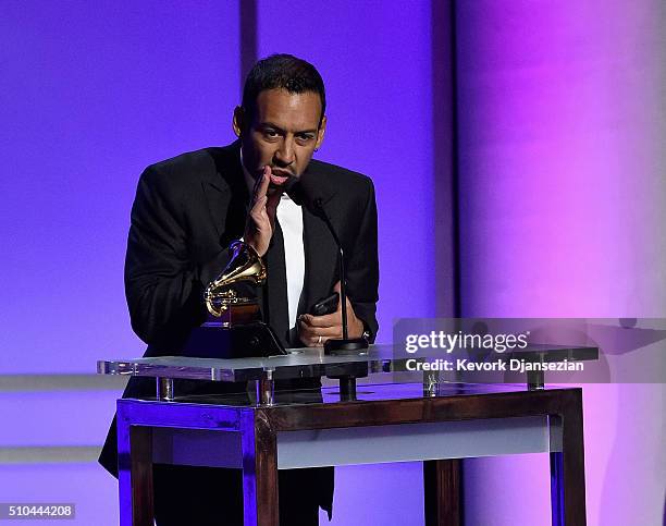 Drummer Antonio Sanchez accepts the award for Best Score Soundtrack for Visual Media for "Birdman" onstage during the GRAMMY Pre-Telecast at The 58th...