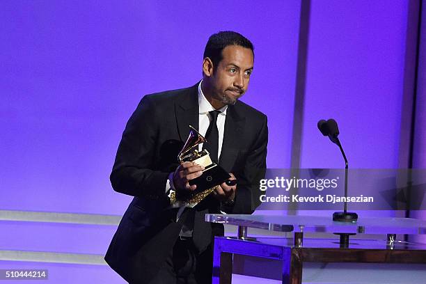 Drummer Antonio Sanchez accepts the award for Best Score Soundtrack for Visual Media for "Birdman" onstage during the GRAMMY Pre-Telecast at The 58th...