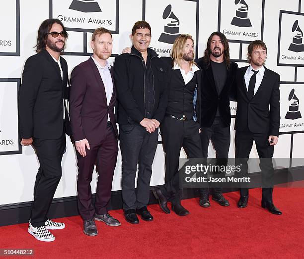 Musicians Franz Stahl, Nate Mendel, Pat Smear, Taylor Hawkins, Dave Grohl, and Chris Shiflett of Foo Fighters attend The 58th GRAMMY Awards at...