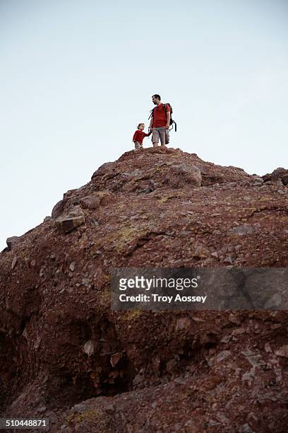 father and son on top of a mountain - tempe arizona stock pictures, royalty-free photos & images