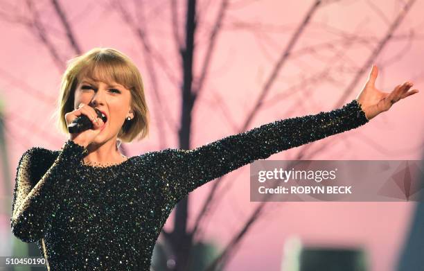 Singer Taylor Swift performs during the 58th Annual Grammy music Awards in Los Angeles February 15, 2016. AFP PHOTO/ ROBYN BECK