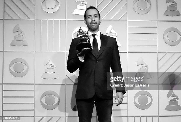Composer Antonio Sanchez, winner of Best Score Soundtrack for Visual Media for 'Birdman', poses in the press room at the The 58th GRAMMY Awards at...