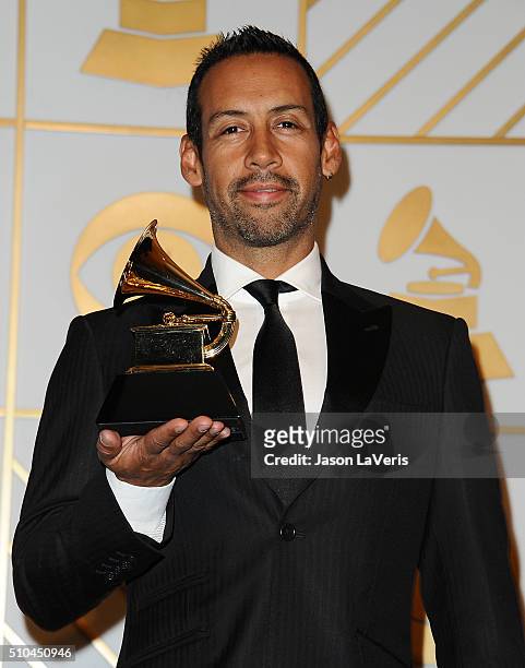Composer Antonio Sanchez, winner of Best Score Soundtrack for Visual Media for 'Birdman', poses in the press room at the The 58th GRAMMY Awards at...