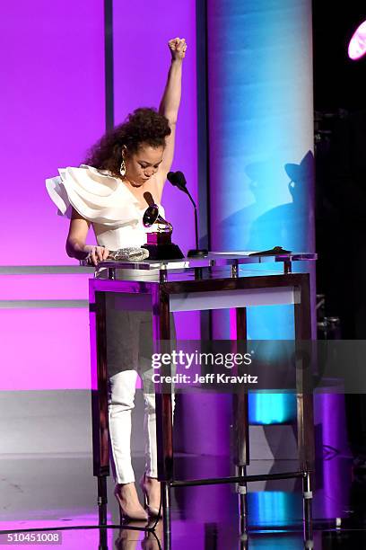 Singer Kendra Foster of The Vanguard accepts the award for Best R&B Song for 'Really Love' onstage during The 58th GRAMMY Premiere Ceremony at Los...