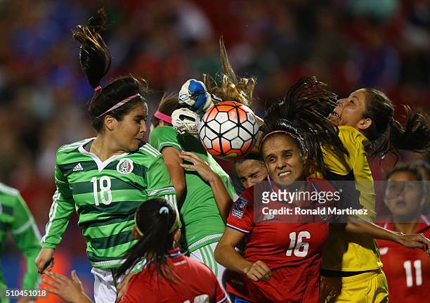 Dinnia Diaz of Costa Rica makes a save against Tanya Samarzich of Mexico during the CONCACAF Women's Olympic Qualifying 2016 at Toyota Stadium on...