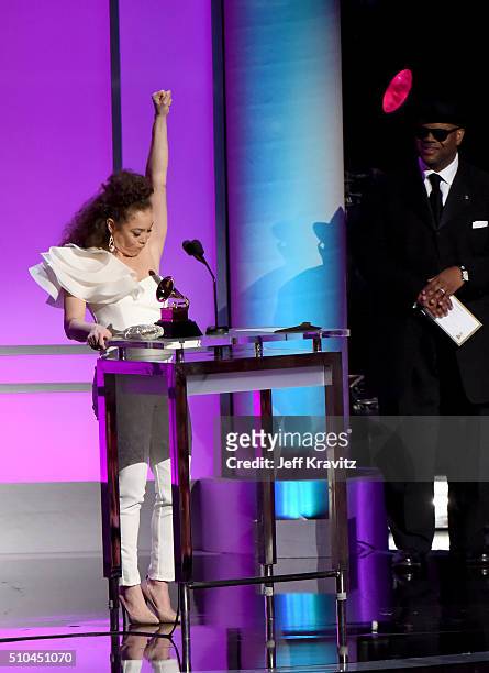 Singer Kendra Foster of The Vanguard accepts the award for Best R&B Song for 'Really Love' alongside record producer Jimmy Jam onstage during The...