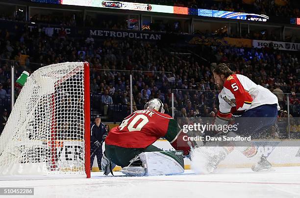 Aaron Ekblad of the Florida Panthers competes in the Discover NHL Shootout against goaltender Devan Dubnyk of the Minnesota Wild during 2016 Honda...