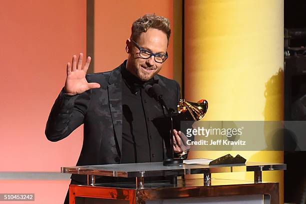 Recording artist TobyMac accepts the award for Best Contemporary Christian Music Album for 'This Is Not A Test' onstage during The 58th GRAMMY...