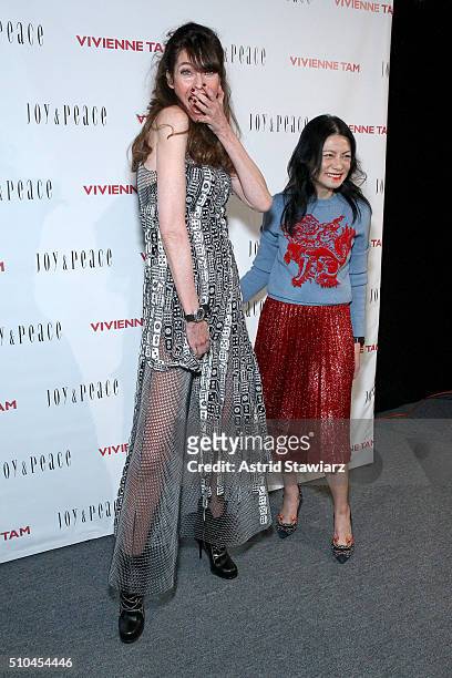 Carol Alt and Vivienne Tam pose backstage at the Vivienne Tam Fall 2016 fashion show during New York Fashion Week: The Shows at The Arc, Skylight at...
