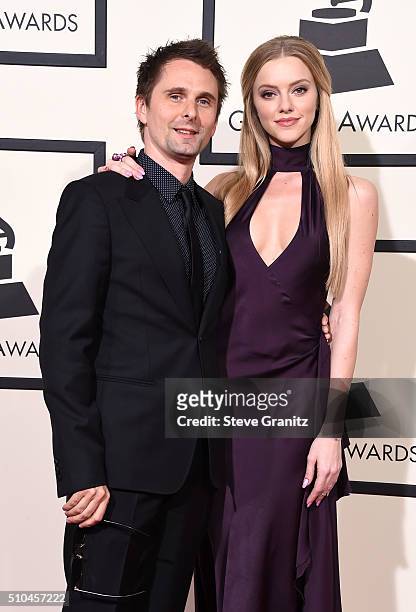 Musician Matthew Bellamy of Muse and model Elle Evans attend The 58th GRAMMY Awards at Staples Center on February 15, 2016 in Los Angeles, California.