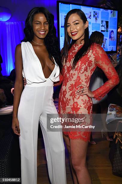 Models Ebonee Davis and Mia Kang pose together at the Sports Illustrated Swimsuit 2016 - Swim City at the Altman Building on February 15, 2016 in New...