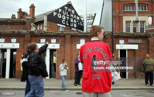 Fulham football club supporters arrive outside Craven Cottage in advance of the friendly match against Watford in London 10 July 2004. The club have...