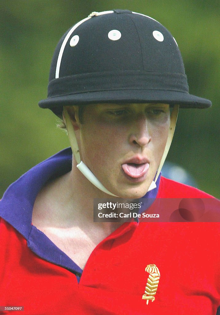 Prince William sticks his tongue out as he participates in the annual ...
