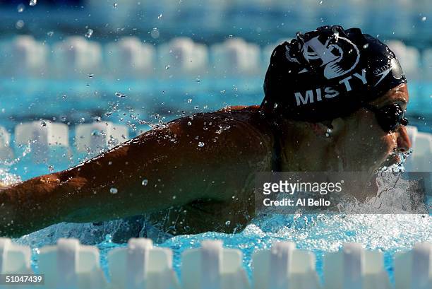 Misty Hyman swims the 200 meter butterfly semifinal during the US Swimming Olympic Team Trials on July 10, 2004 at the Charter All Digital Aquatic...