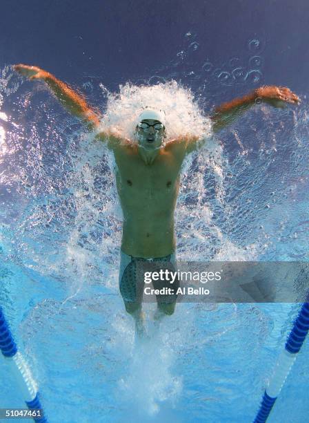 Michael Phelps swims the 200 meter butterfly final during the US Olympic Swimming Team Trials on July 10, 2004 Charter All Digital Aquatics Centre in...