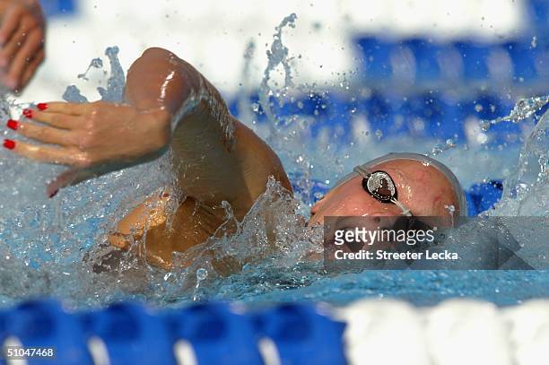 Dana Vollmer swims en route to winning the 200 meter freestyle final during the US Swimming Olympic Team Trials on July 10, 2004 at the Charter All...