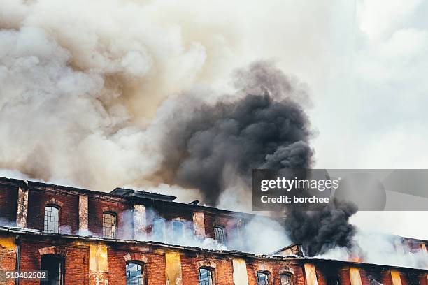 burning old building - brick house stock pictures, royalty-free photos & images