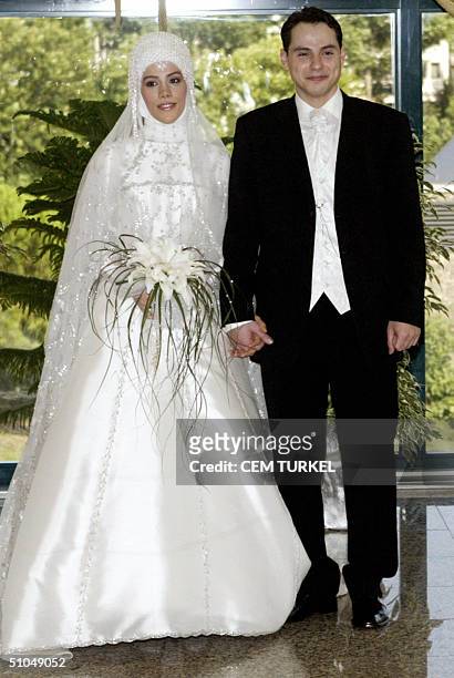 Turkish Prime Minister Recep Tayyip Erdogan's daughter Esra Erdogan poses with her husband Berat Albayrak just before the wedding ceremony in...