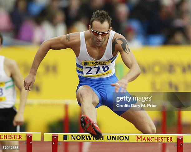 Chris Rawlinson on his way to winning the men's 400m hurdles during the Norwich Union Olympic Trials and AAA Championships at the Manchester Regional...