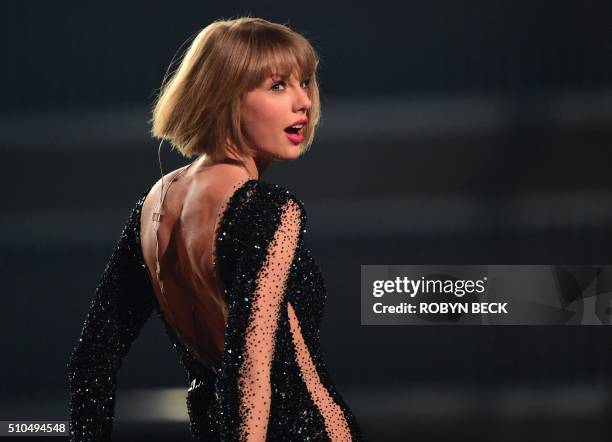 Singer Taylor Swift performs onstage during the 58th Annual Grammy music Awards in Los Angeles February 15, 2016. AFP PHOTO/ ROBYN BECK