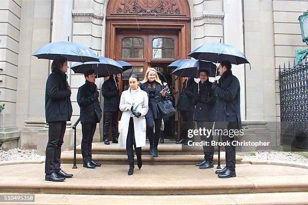 Guests leave the Carolina Herrera show during Fall 2016 New York Fashion Week in the Frick Museum on February 15, 2016 in New York City.
