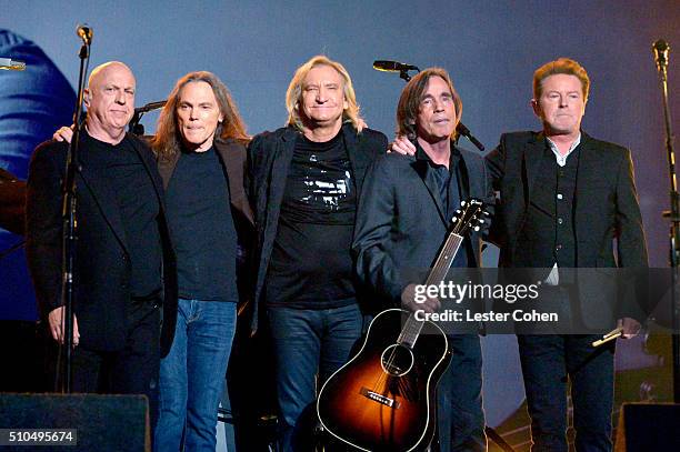 Musicians Bernie Leadon, Timothy B. Schmit, Joe Walsh and Don Henley of The Eagles perform with Jackson Browne onstage during The 58th GRAMMY Awards...