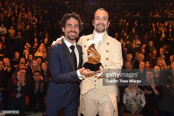 Music director Alex Lacamoire and Actor, composer Lin-Manuel Miranda celebrate on stage the receiving of GRAMMY award after during "Hamilton" GRAMMY...
