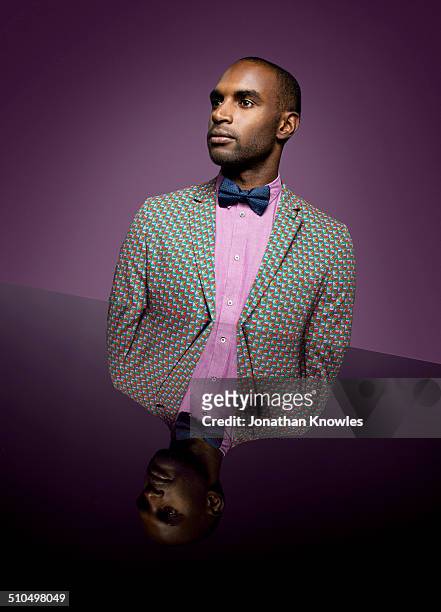 vibrant portrait of male with reflection - bow tie stock-fotos und bilder