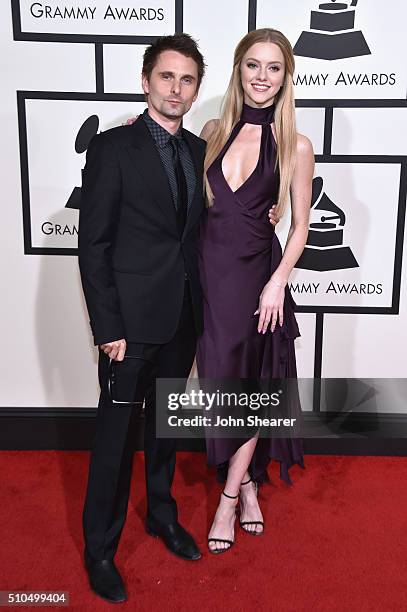 Musician Matthew Bellamy of Muse and model Elle Evans attend The 58th GRAMMY Awards at Staples Center on February 15, 2016 in Los Angeles, California.