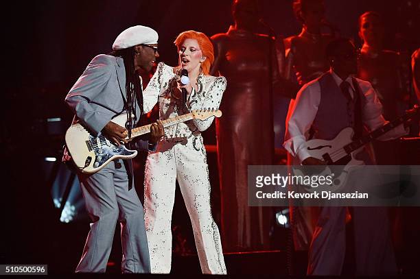 Singer Lady Gaga , accompanied by musician/producer Nile Rodgers , performs a tribute to the late David Bowie onstage during The 58th GRAMMY Awards...
