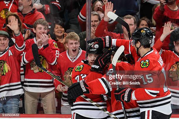 Artemi Panarin of the Chicago Blackhawks celebrates with teammates after scoring in the third period of the NHL game against the Toronto Maple Leafs...