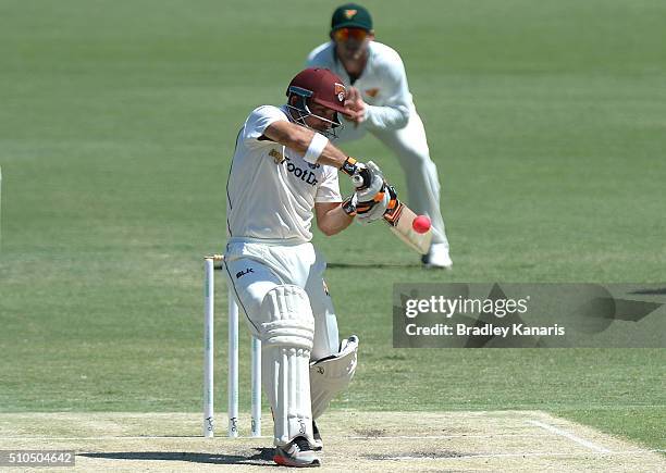 Chris Hartley of Queensland plays a shot during day three of the Sheffield Shield match between Queensland and Tasmania at The Gabba on February 16,...