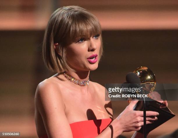 Singer Taylor Swift accepts the award for the Album of the Year onstage during the 58th Annual Grammy music Awards in Los Angeles February 15, 2016....
