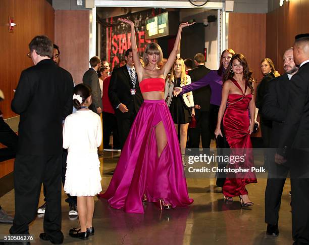 Singer Taylor Swift and Selena Gomez attend The 58th GRAMMY Awards at Staples Center on February 15, 2016 in Los Angeles, California.