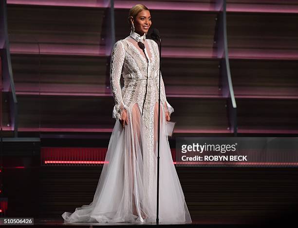 Beyonce speaks onstage during the 58th Annual Grammy music Awards in Los Angeles February 15, 2016. AFP PHOTO/ ROBYN BECK / AFP / ROBYN BECK