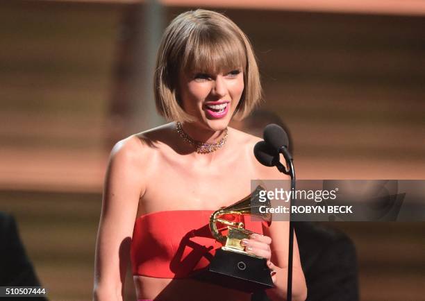 Singer Taylor Swift accepts the award for the Album of the Year onstage during the 58th Annual Grammy music Awards in Los Angeles February 15, 2016....