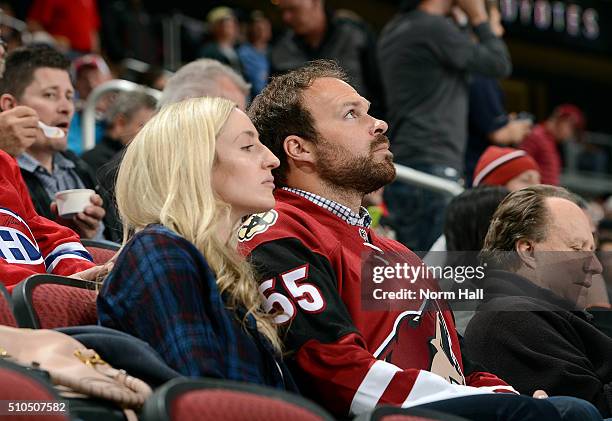 Arizona Diamondbacks pitcher Josh Collmenter watches a game between the Arizona Coyotes and Montreal Canadiens at Gila River Arena on February 15,...