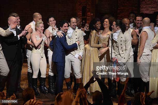 Music director Alex Lacamoire and actor, composer Lin-Manuel Miranda and cast of "Hamilton" celebrate on stage the receiving of GRAMMY award after...