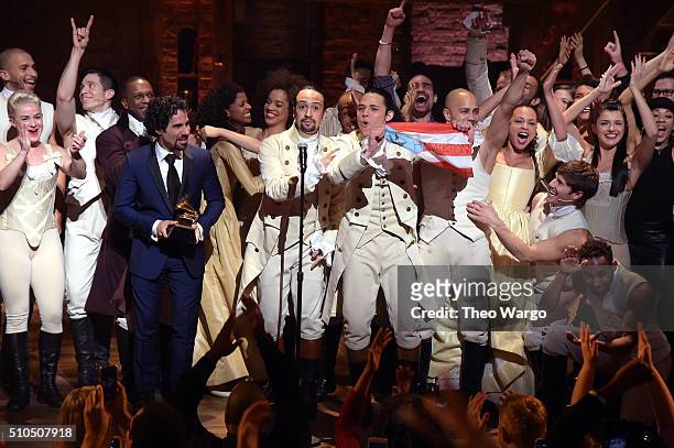 Music director Alex Lacamoire and Actor, composer Lin-Manuel Miranda celebrate on stage during "Hamilton" GRAMMY performance for The 58th GRAMMY...