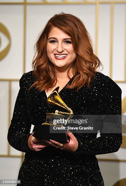 Recording artist Meghan Trainor, winner of the Best New Artist award, poses in the press room during The 58th GRAMMY Awards at Staples Center on...