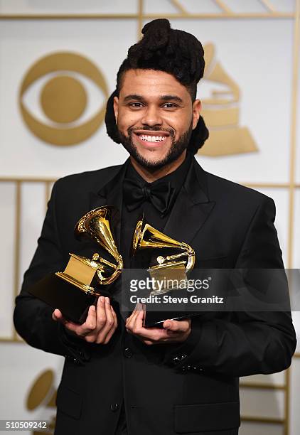 Recording artist The Weeknd, winner of the Best R&B Performance award for 'Earned It ' and Best Urban Contemporary Album award for 'Beauty Behind the...