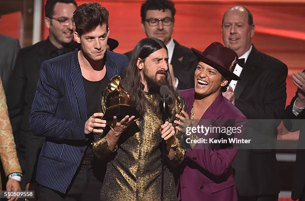 Producers Mark Ronson, Jeff Bhasker, and recording artist Bruno Mars accept the Record Of The Year award for 'Uptown Funk' onstage during The 58th...