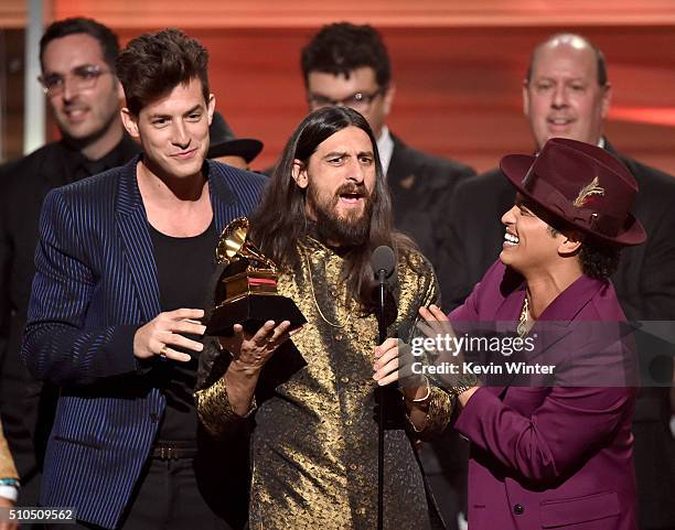 Producers Mark Ronson, Jeff Bhasker, and recording artist Bruno Mars accept the Record Of The Year award for 'Uptown Funk' onstage during The 58th...