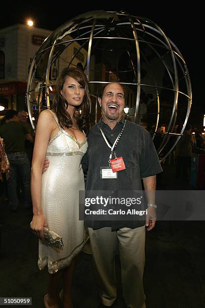 Model Melania Knauss and NBC executive Vince Manze at the NBC TCA All - Star Party at Univeral Studios July 11, 2004 in Los Angeles, California.