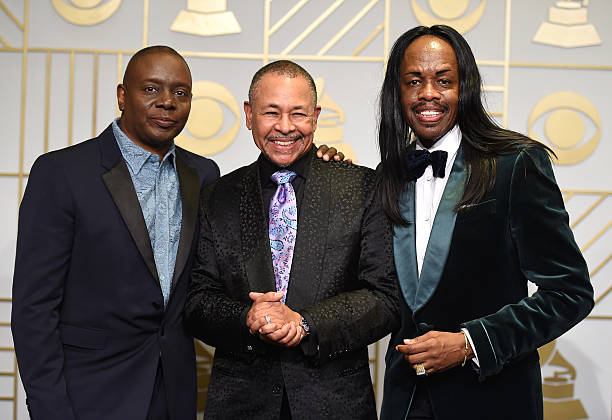 Recording artists Philip Bailey, Ralph Johnson, and Verdine White of music group Earth, Wind & Fire pose in the press room during The 58th GRAMMY...