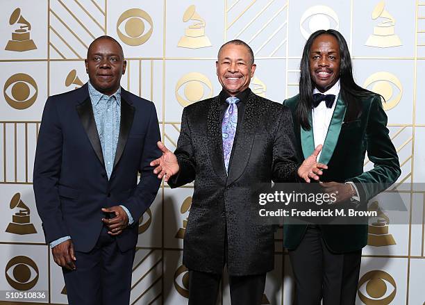 Musicians Philip Bailey, Ralph Johnson and Verdine White of Earth, Wind & Fire pose in the press room during The 58th GRAMMY Awards at Staples Center...